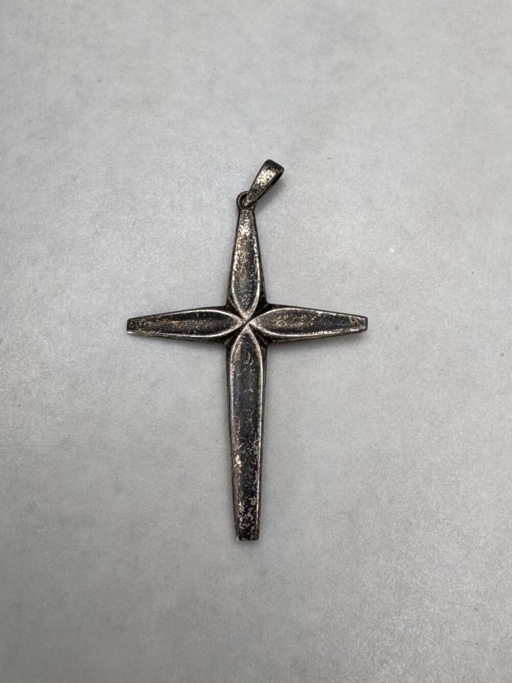 Vintage Mexican sterling silver cross pendant featuring a simple classic design.